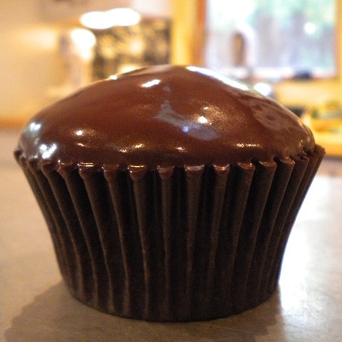 Vegan chocolate cupcake with ganache.